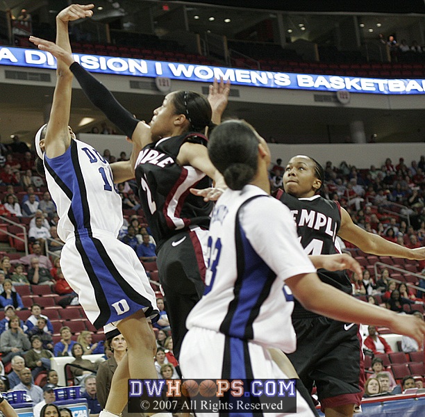 ...launches the contested shot...