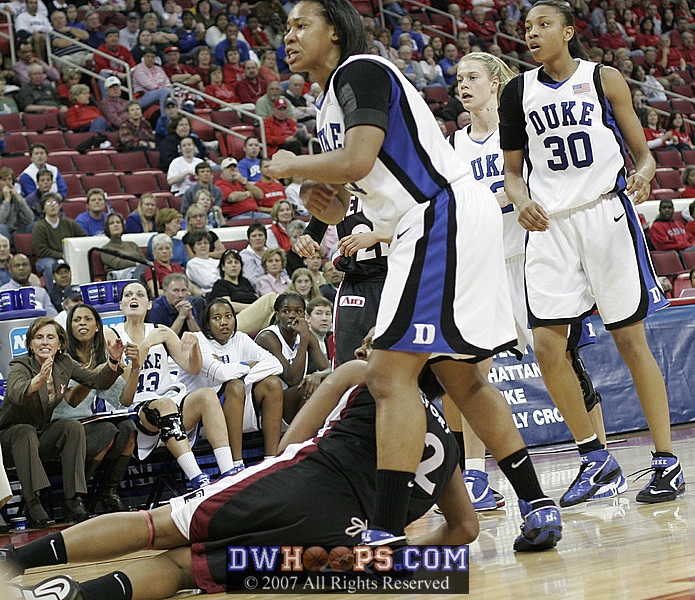 Off the Smith miss, a Duke triple team forces Lady Comfort into a travel