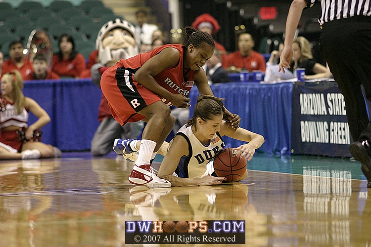Abby Waner tries to control a loose ball