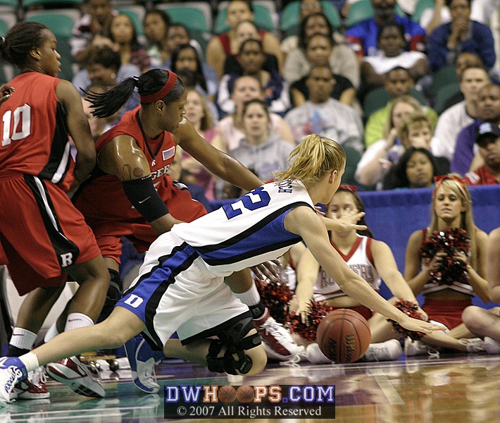 Brittany Mitch is fouled going for a rebound