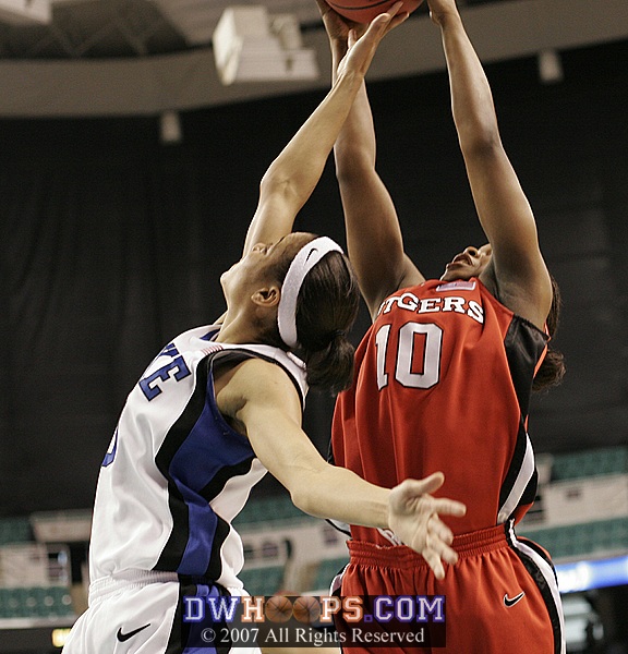 Lindsey Harding tries for a rebound...