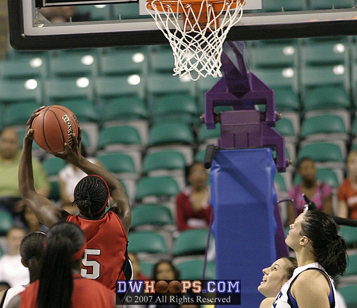 Essence Carson drives and misses