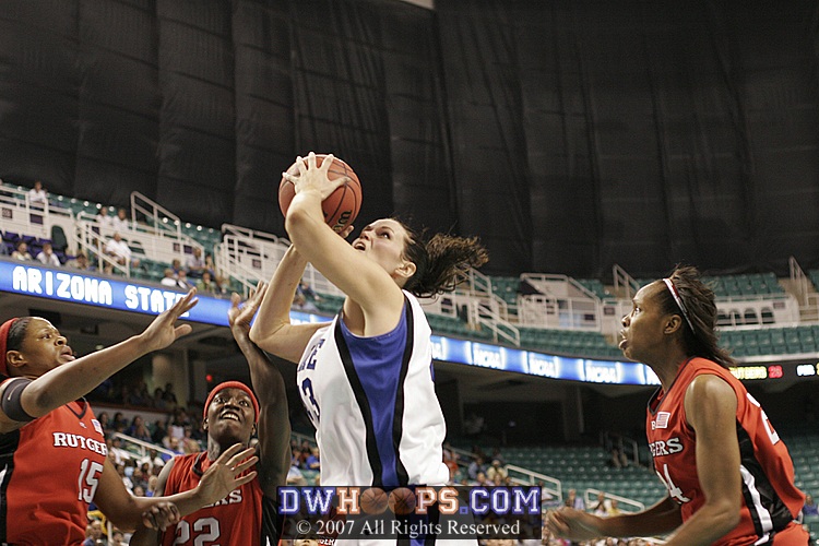 Alison Bales, about to be fouled by Myia Mccurdy (right)