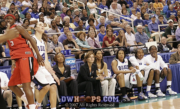 Abby and the Duke bench watch her three point attempt...no good