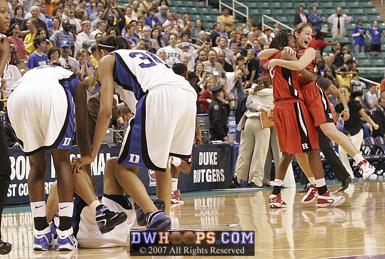 Bridgette and Carrem console their friend as Rutgers players celebrate