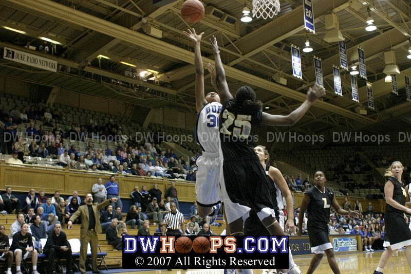 Carrem Gay posts up Kentrina Wilson