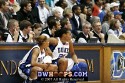  - Jasmine Thomas and Joy Cheek wait for a break in the action to enter
