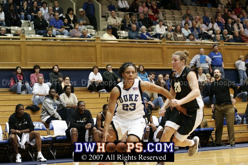 Duke's Wanisha Smith drives to the basket...