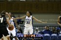  - Carrem Gay and Chante Black (left) pose a considerable defensive obstacle for Team Reebok's Sidney Spencer
