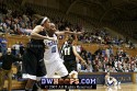  - Team Reebok's Courtney McDaniel and Duke's Chante Black battle for position as  Jasmine Thomas launches a shot from outside