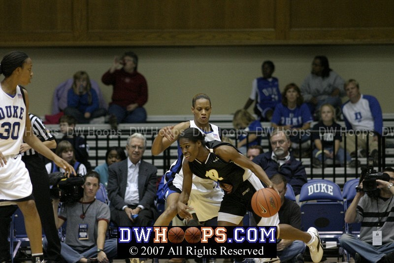 Jasmine Thomas gets a well manicured hand into the path of Fatima Maddox...