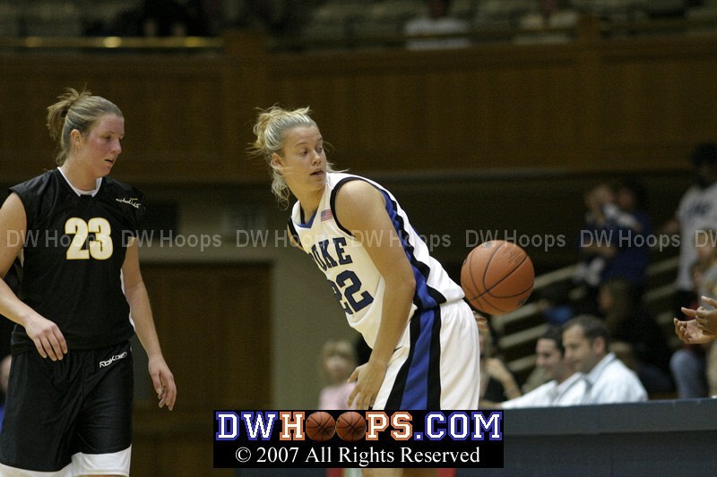 Brittany Mitch flips a behind the back pass to a pair of waiting hands - Katie Alsdurf looks impressed