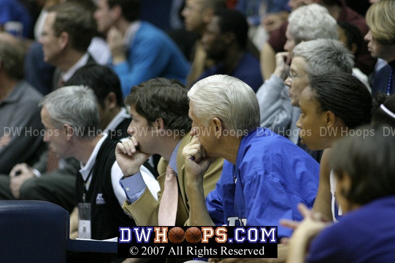 Senior Manager Ben Adams and Al Brown watch Duke on defense