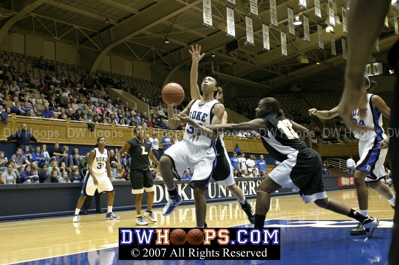 Dominique Redding reaches in on Carrem Gay