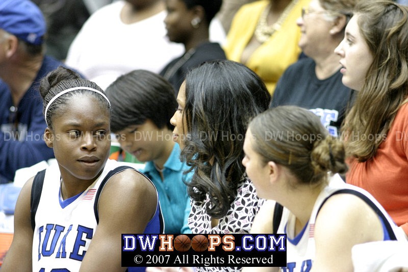 Karima Christmas and Shannon Perry on the Duke bench