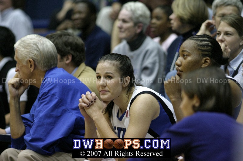 Abby Waner watches from the Duke bench after a 4-6 3FG evening