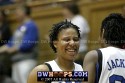  - Wanisha Smith and Keturah Jackson celebrate a Karima Christmas block on the Duke bench