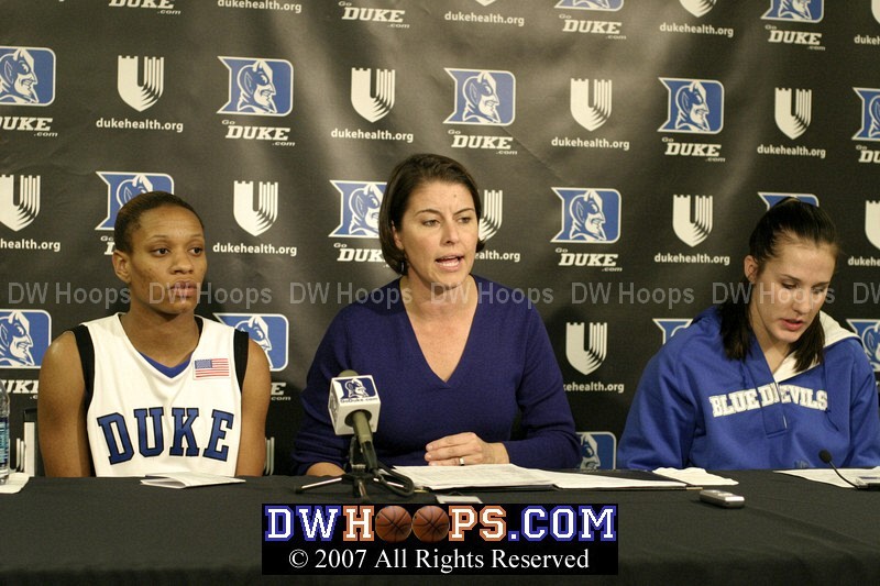 Jasmine Thomas, Coach P, and Abby Waner in the media room