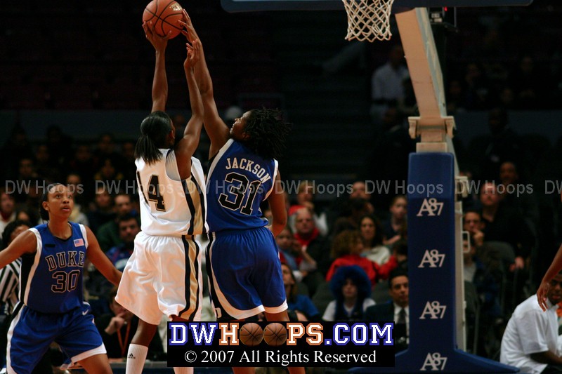 Keturah Jackson blocks Jania Sims