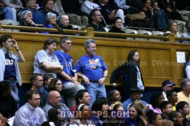 Some of the usual suspects look on from the last row of the bleachers