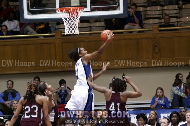 Chante Black is fouled attempting the reverse layup