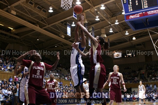 Chante Black battles Jacinta Monroe for the rebound of a Smith miss