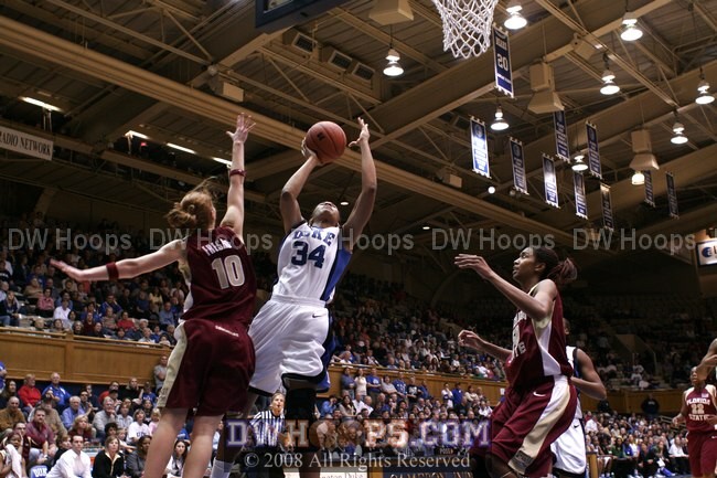Krystal Thomas scores on the Duke fast break and was fouled