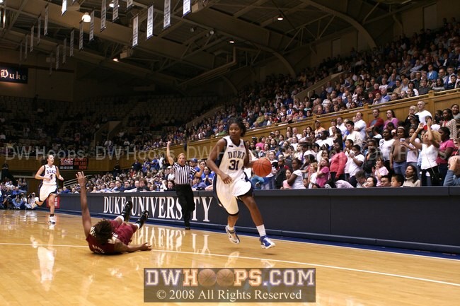 Keturah Jackson draws an open court foul from Alysha Harvin