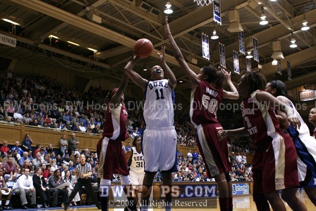 While it looks like the foul could have come from behind, Monroe is whistled for fouling Chante Black