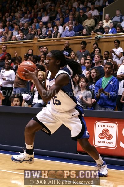 Bridgette heads to the basket...