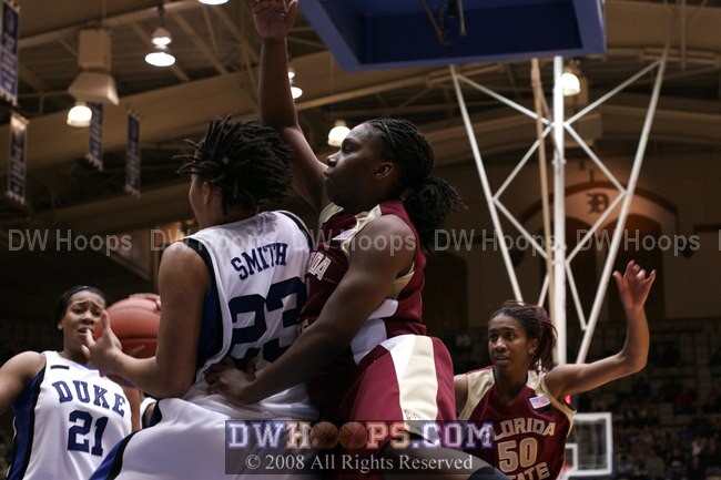 Wanisha Smith rebounds the Monroe miss