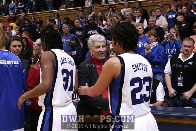 Coach Yow and Wanisha Smith in the handshake line