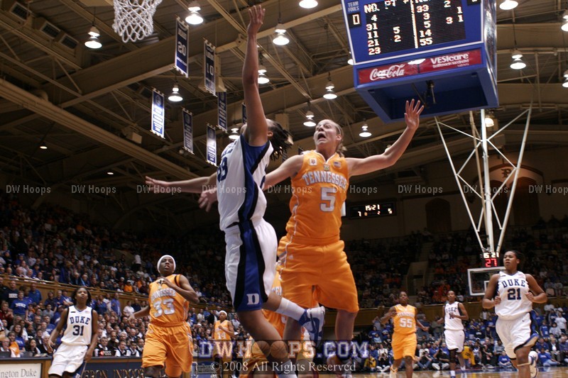 ...with the perfect Blue Devil layup reflected in Angie Bjorklund's face