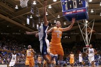 ...with the perfect Blue Devil layup reflected in Angie Bjorklund's face - 9-5 - 15:19 1st