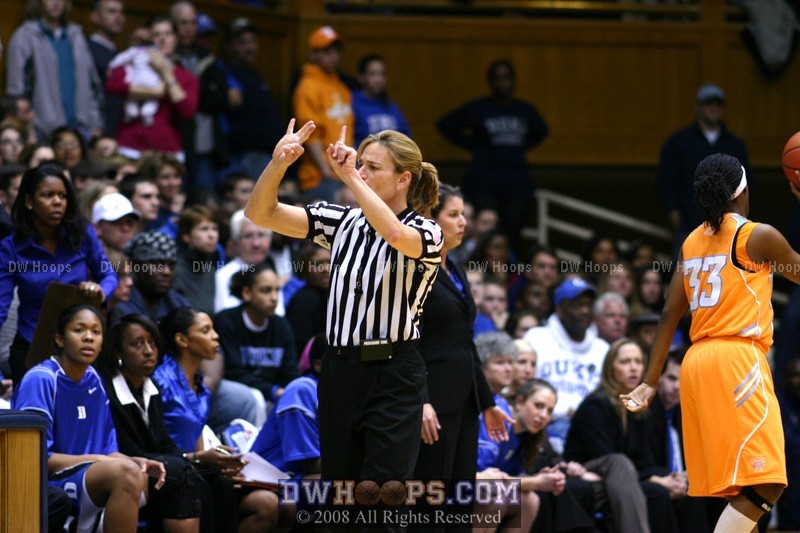Dee Kantner signals the foul on Keturah Jackson