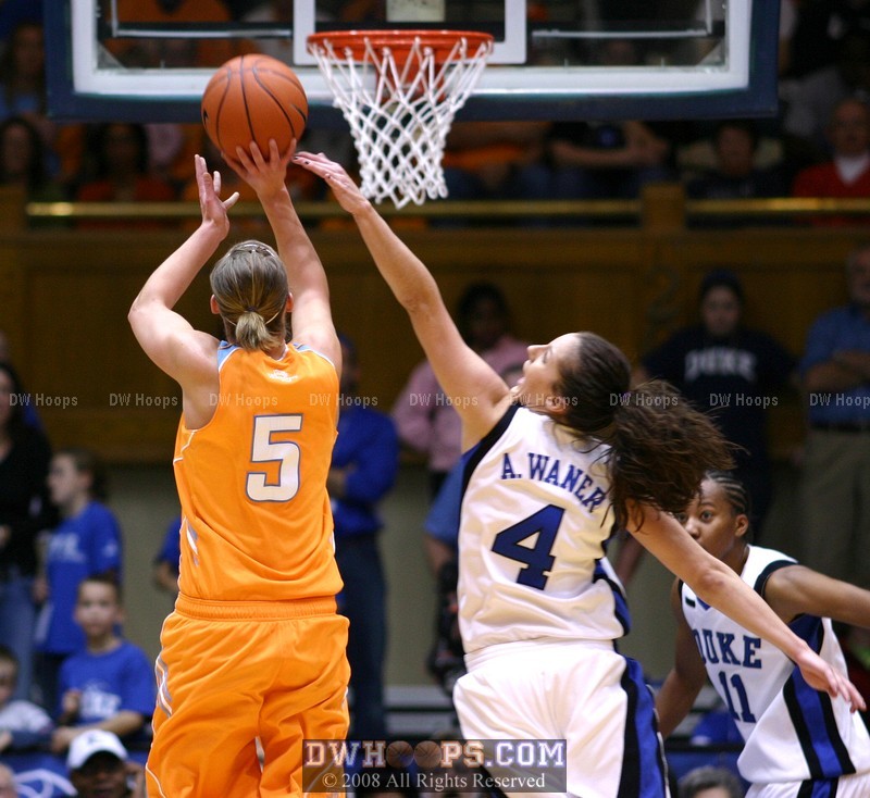 Abby Waner blocks Angie Bjorklund's jump shot