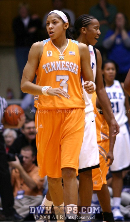 Candace Parker heads upcourt as Chante Black expresses her disbelief at a jump ball call