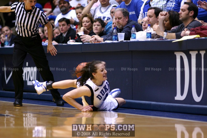 Abby hits just about everything trying to rebound the Black miss