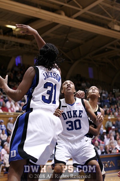 Carrem Gay looks for a rebound after KJ's layup is spinning out