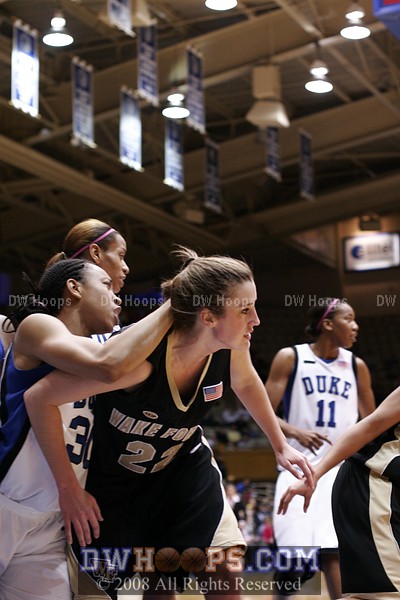 Carrem Gay and Christen Brown battle in the low post as the ball goes out to Wake