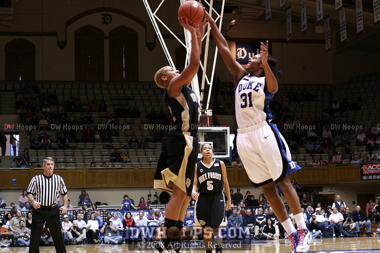 Keturah Jackson blocks Alex Tchangoue's three with 1 on the shot clock - a Deacon turnover