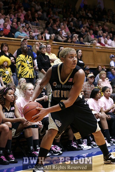 Wake Forest guard Alex Tchangoue looks for an opening to pass into the post