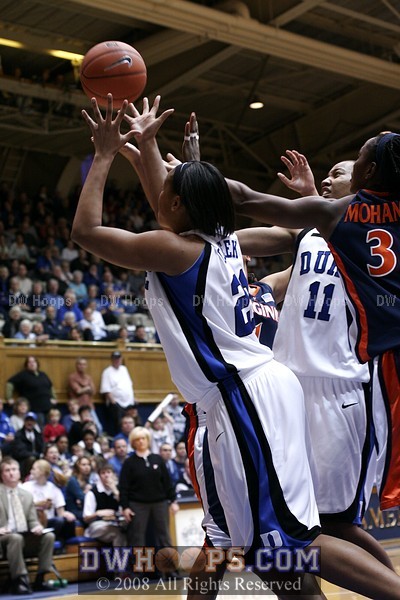 Sequence: Wanisha Smith missed layup and Joy Cheek offensive board
