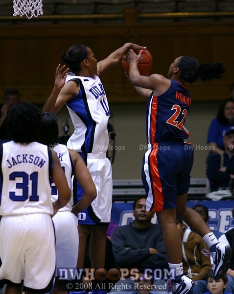 Chante Black gives Monica Wright's layup a picture perfect rejection, spoiling UVa's set play off their time out