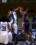 Chante Black gives Monica Wright's layup a picture perfect rejection, spoiling UVa's set play off their time out - 10-4 - 16:48 1st