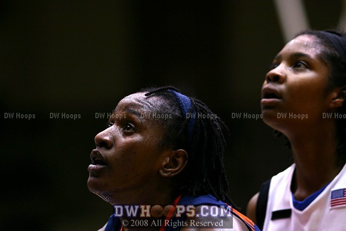 Aisha Mohammed (left) and Keturah Jackson watch Chante Black's free throw drop