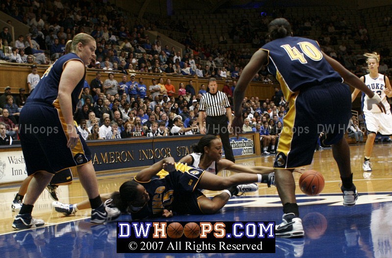 One of many battles for loose balls on the floor