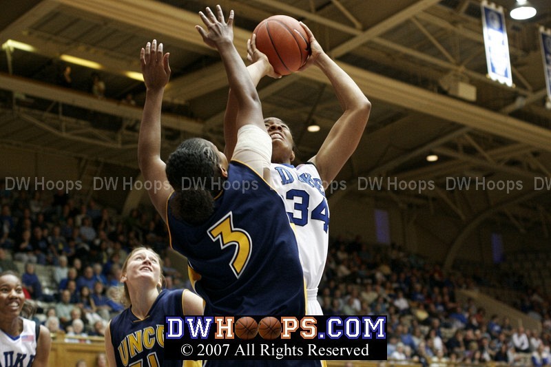 Another basket for K. Thomas, this time converting a J. Thomas miss
