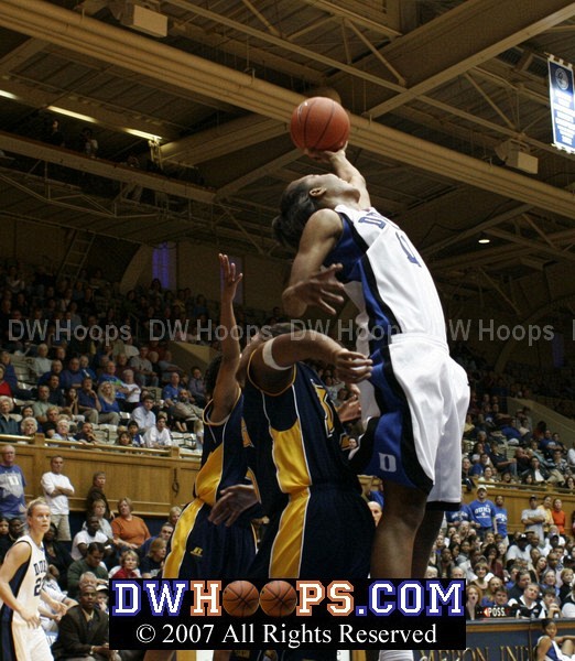 Chante Black reaches way back for a rebound and is fouled