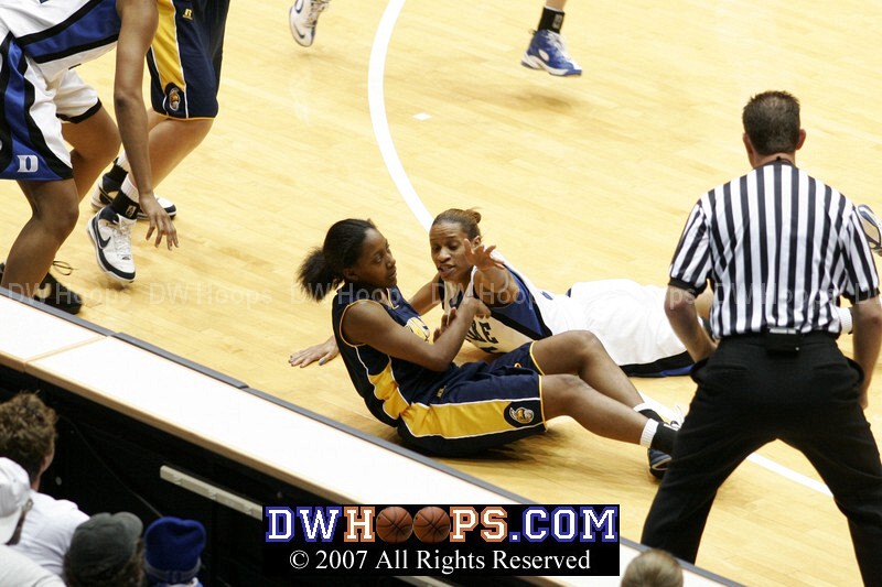Jasmine Thomas battles for a loose ball